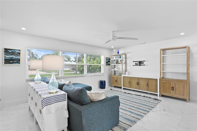 tiled living room with ceiling fan