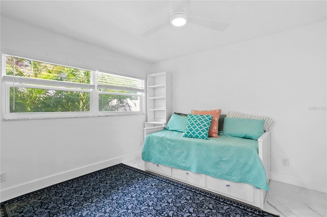 bedroom featuring ceiling fan