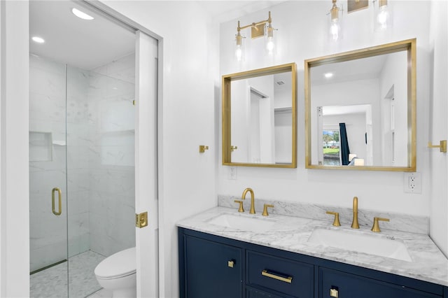 bathroom featuring toilet, dual bowl vanity, and walk in shower