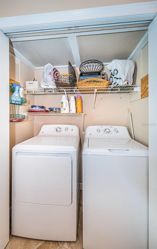 laundry room featuring separate washer and dryer