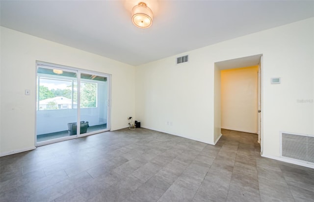 spare room with tile patterned floors