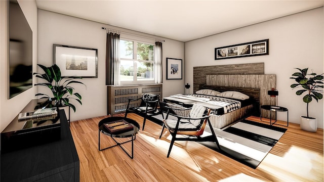 bedroom with wood finished floors