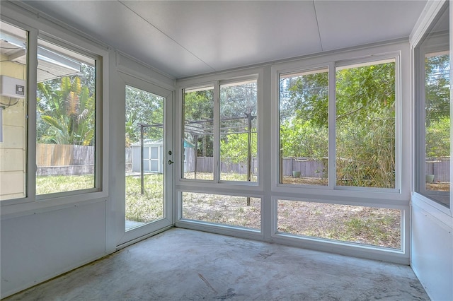 unfurnished sunroom with a healthy amount of sunlight