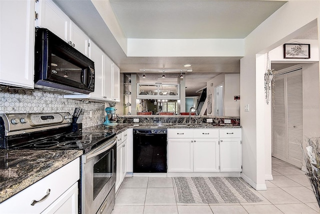 kitchen with sink, white cabinetry, light tile patterned floors, and black appliances