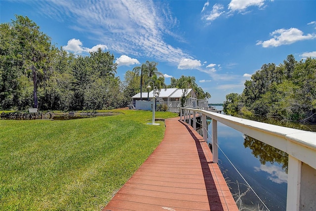 dock area with a yard