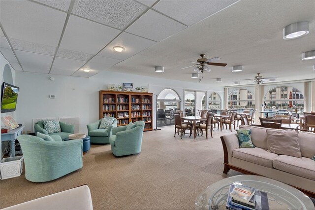 19029 US Highway 19 N Unit 12B, Clearwater, FL 33764 - living area featuring ceiling fan and light carpet