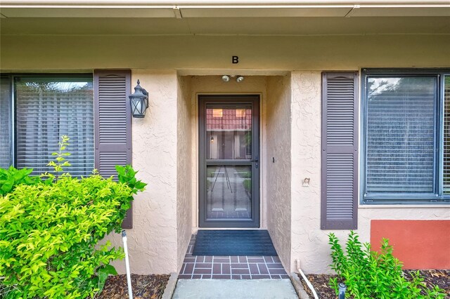 19029 US Highway 19 N Unit 12B, Clearwater, FL 33764 - property entrance featuring stucco siding