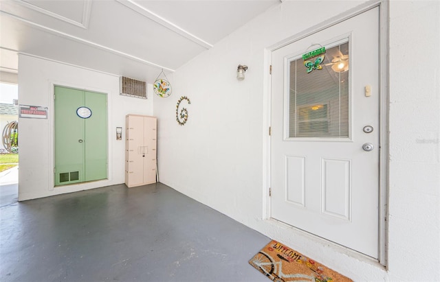 entrance to property featuring visible vents