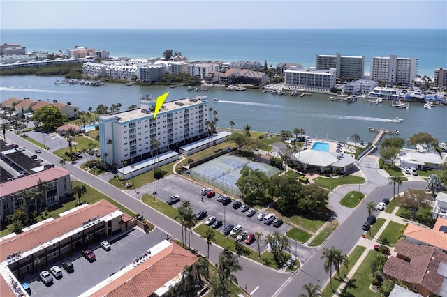 birds eye view of property featuring a water view