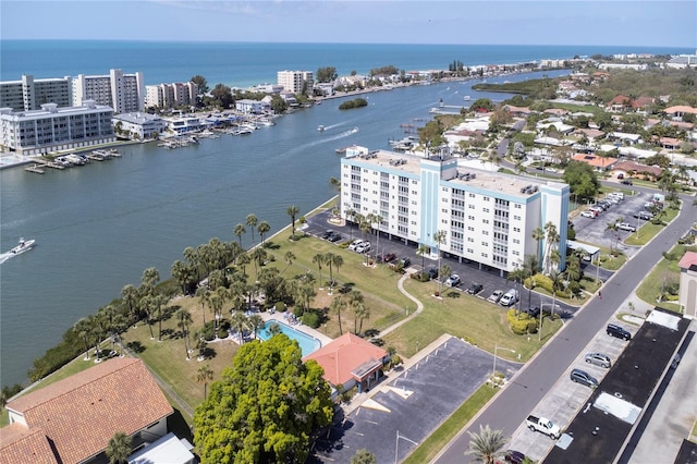 birds eye view of property featuring a water view