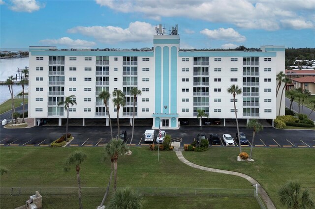 view of building exterior with a water view