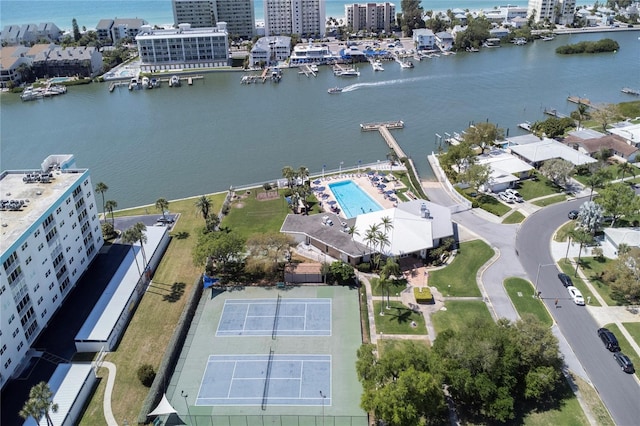 birds eye view of property with a view of city and a water view