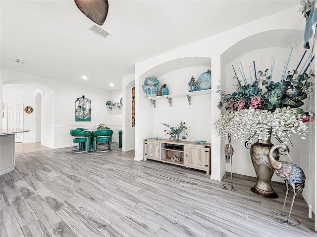 entrance foyer with light hardwood / wood-style flooring