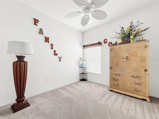 unfurnished bedroom featuring ceiling fan and light carpet