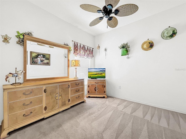 bedroom with ceiling fan and light colored carpet