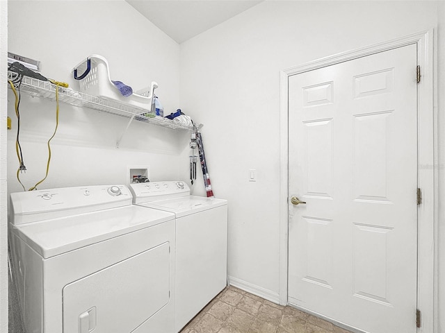 clothes washing area with independent washer and dryer