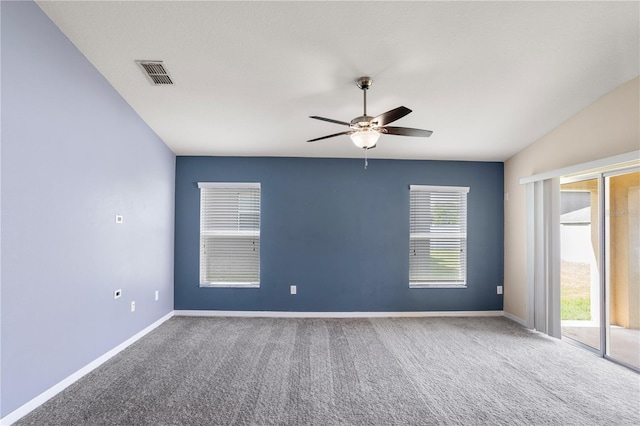 spare room with ceiling fan and carpet flooring