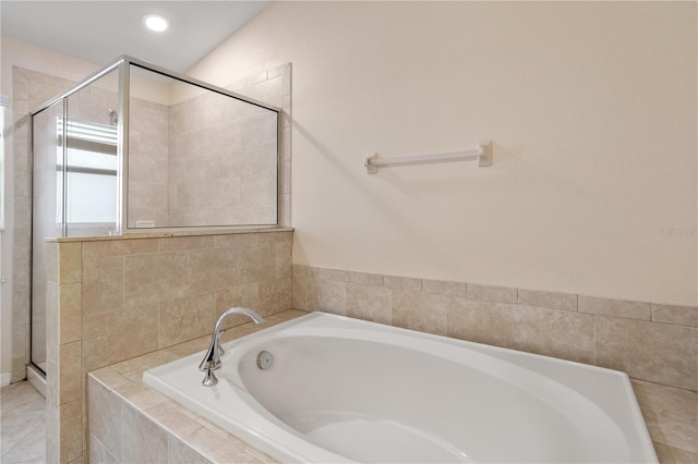 bathroom with tile patterned flooring and plus walk in shower