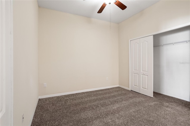 unfurnished bedroom with a closet, ceiling fan, and carpet