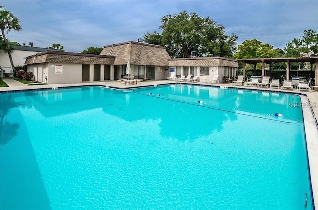 view of pool featuring a patio area