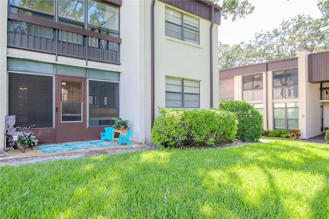 exterior space with a lawn