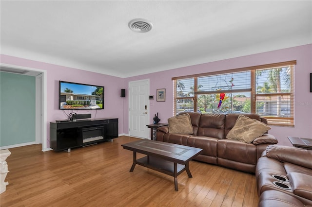 living room with hardwood / wood-style floors