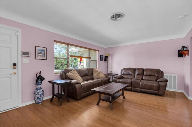 living room featuring light wood-type flooring