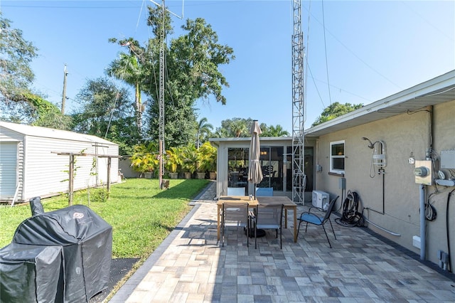 view of patio featuring an outdoor structure