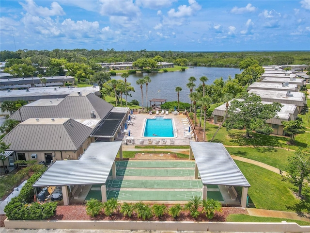 birds eye view of property featuring a water view