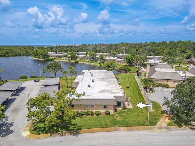 drone / aerial view with a water view