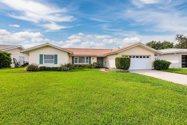 ranch-style home featuring concrete driveway, a tile roof, an attached garage, a front lawn, and stucco siding