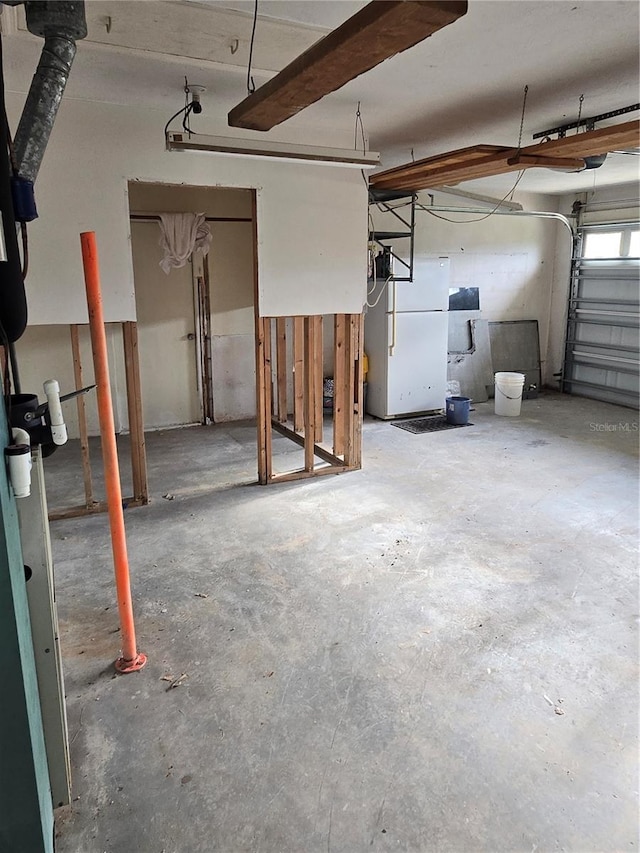 garage featuring white refrigerator