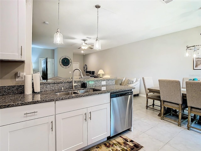 kitchen with ceiling fan, white cabinetry, dishwasher, light tile patterned floors, and sink