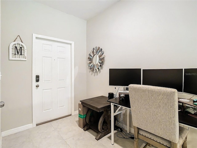 office space with light tile patterned flooring