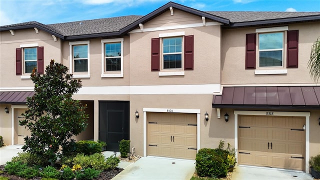 view of property featuring a garage