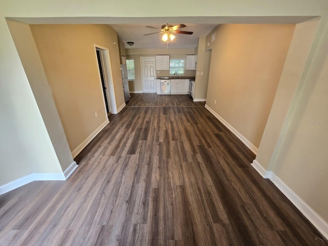 hall featuring sink and dark hardwood / wood-style flooring