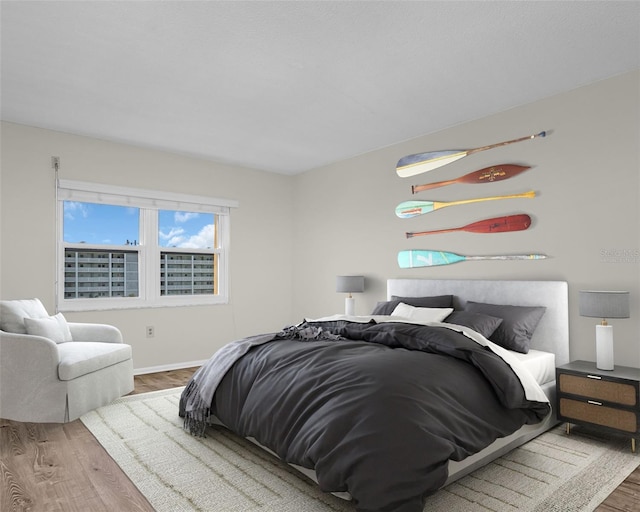 bedroom featuring wood-type flooring