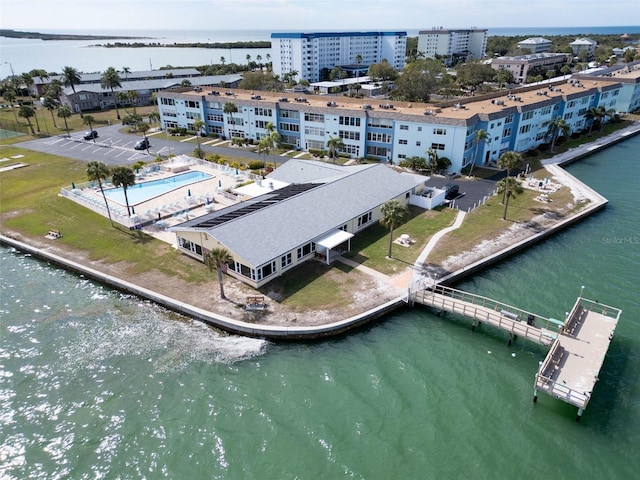 birds eye view of property featuring a water view