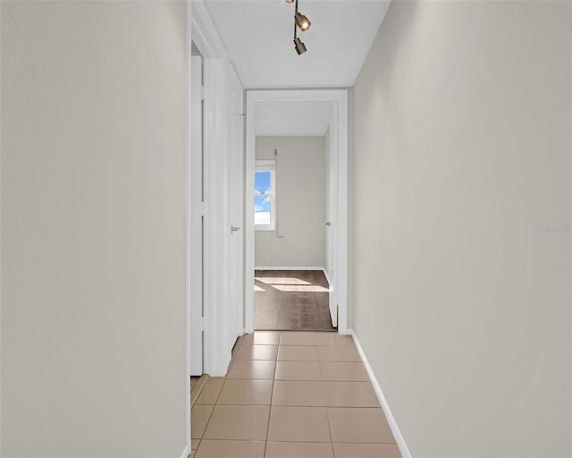 hall featuring tile patterned floors