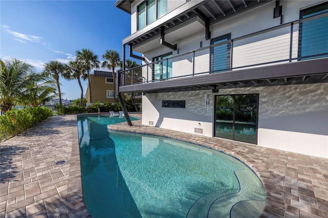 view of pool with a patio area