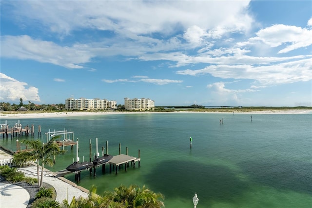 property view of water featuring a dock and boat lift