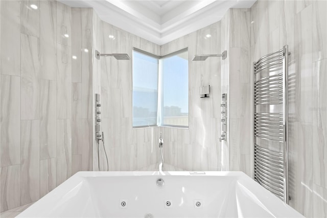 full bathroom featuring a whirlpool tub, a shower, radiator heating unit, and tile walls