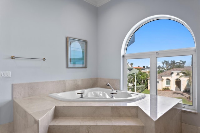 bathroom with a garden tub