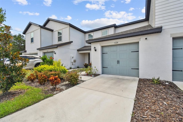 view of front of home with a garage