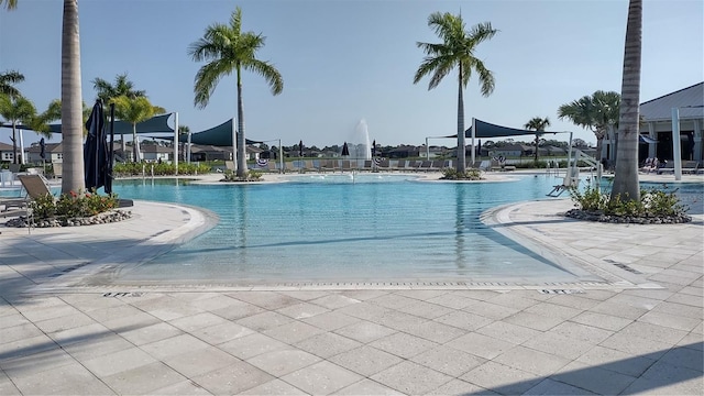 community pool featuring a patio