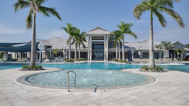 community pool with a patio