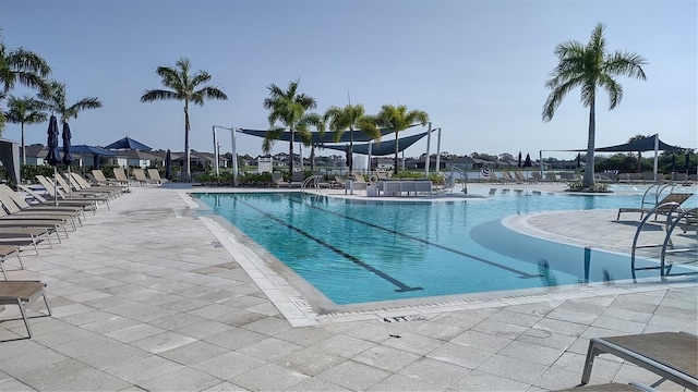 pool with a patio