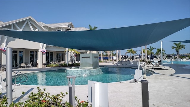 community pool with a patio