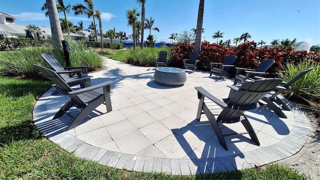 view of patio featuring a fire pit