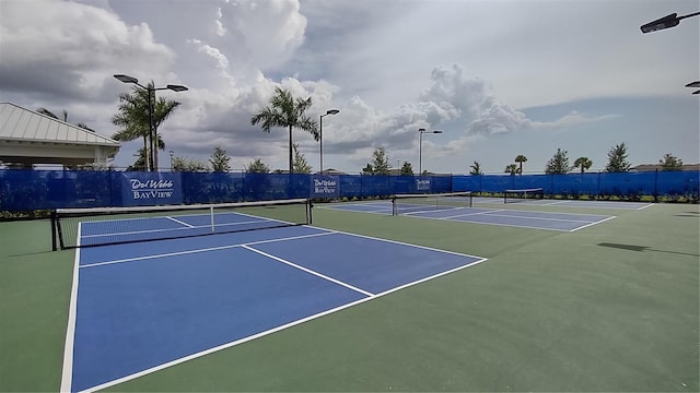 view of sport court with community basketball court and fence